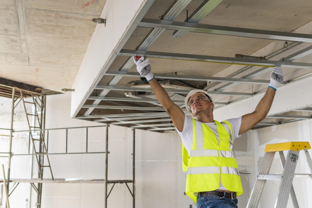 front view man working wearing protection gear